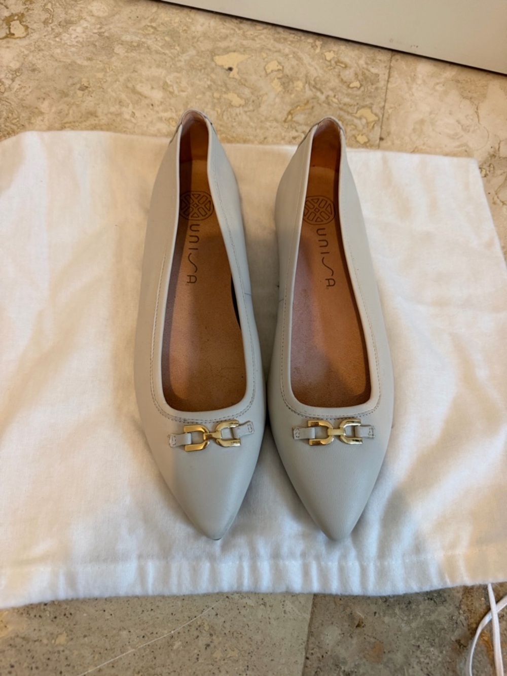 Unisa Pointed Toe Leather Flats in Cream with Gold Hardware